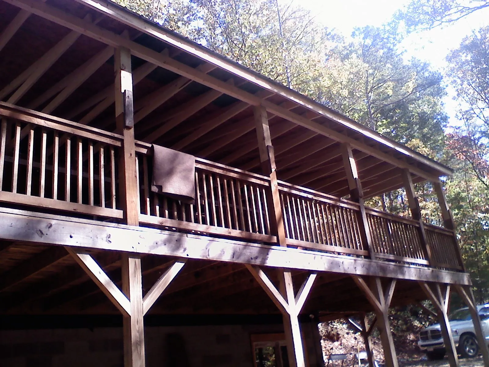 Timber framing under a new elevated porch and deck — Roof Leak Repair in Metz by Roofing Brothers